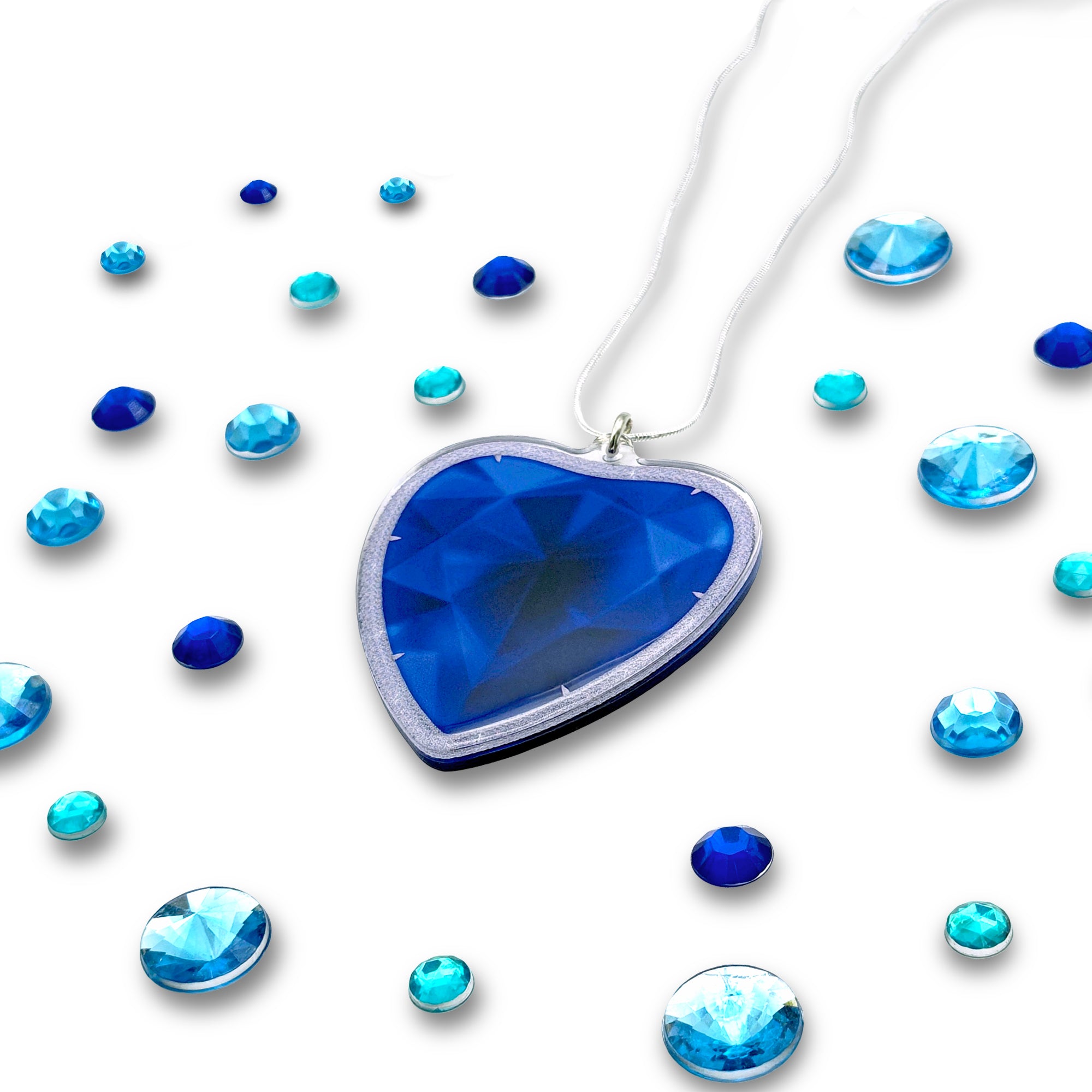 Heart-shaped blue diamond pendant, inspired by the Heart of the Ocean necklace from the film Titanic - made by Merpola for Titanic Merch
